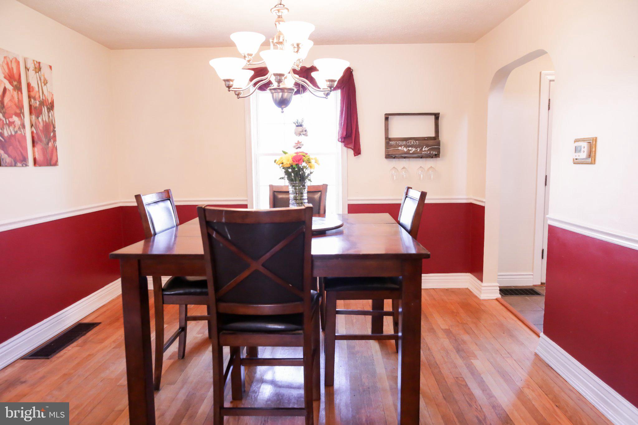 174 Armstrong Street Romney, WV 26757 - Photo 2 of 28 Charming dining space with warm hues.