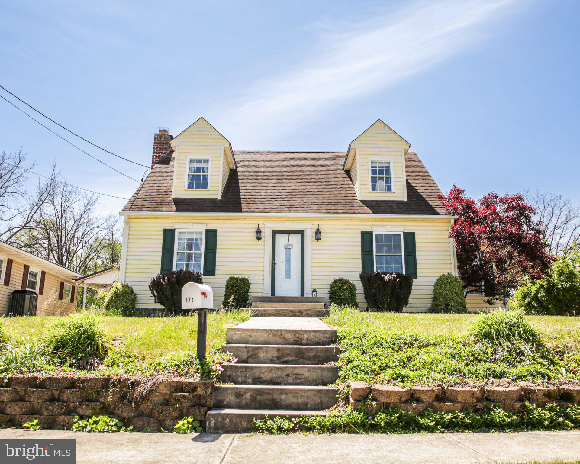 174 Armstrong Street Romney, WV 26757 - Photo 3 of 28 Charming Cape Cod with inviting curb appeal.