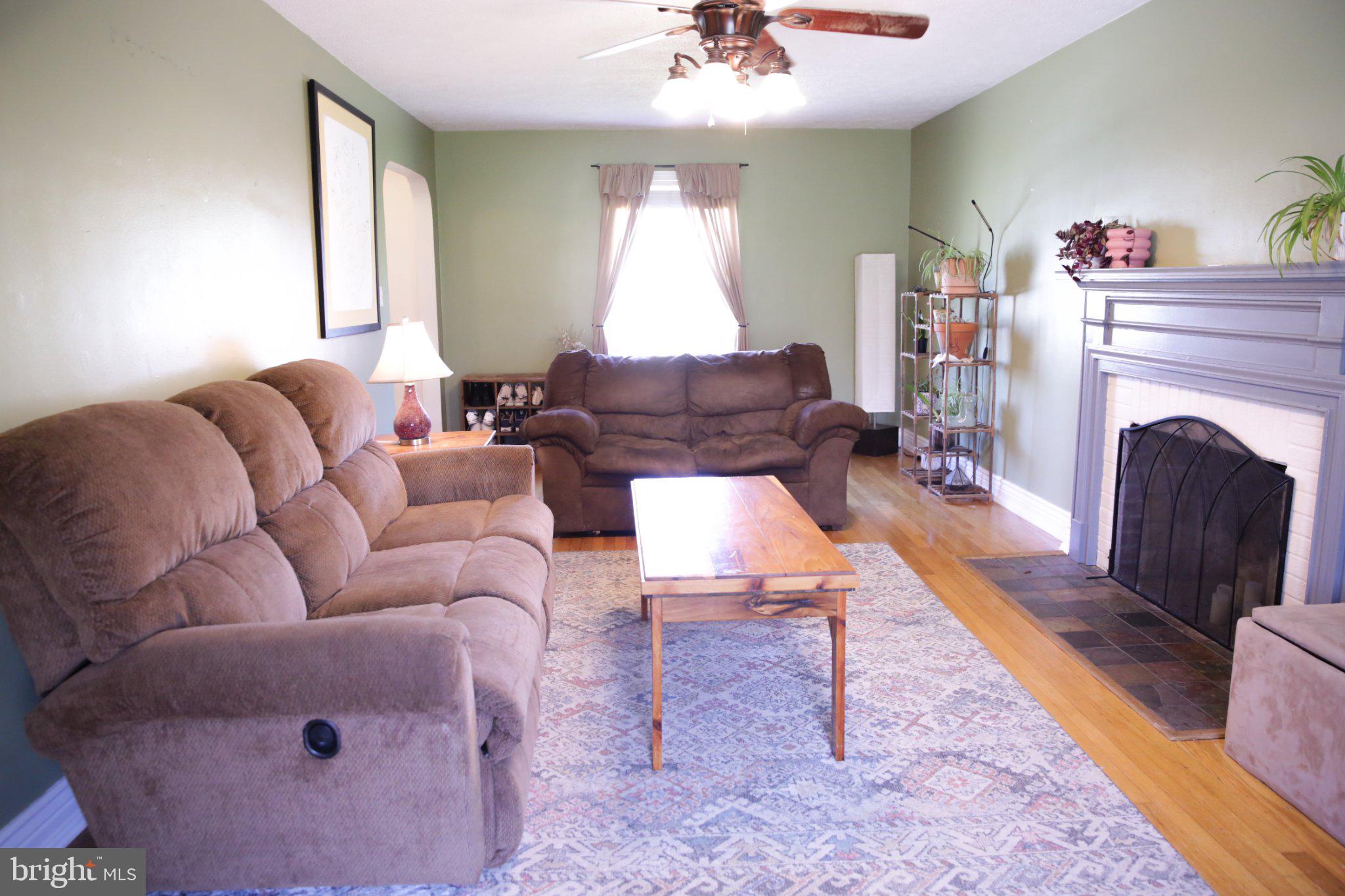174 Armstrong Street Romney, WV 26757 - Photo 10 of 28 Cozy living space with warm hues.