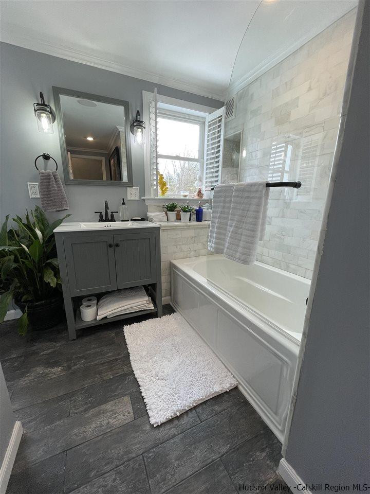 434 Cottekill Road Kingston, NY 12401 - Photo 13 of 35 a bathroom with a tub sink and mirror