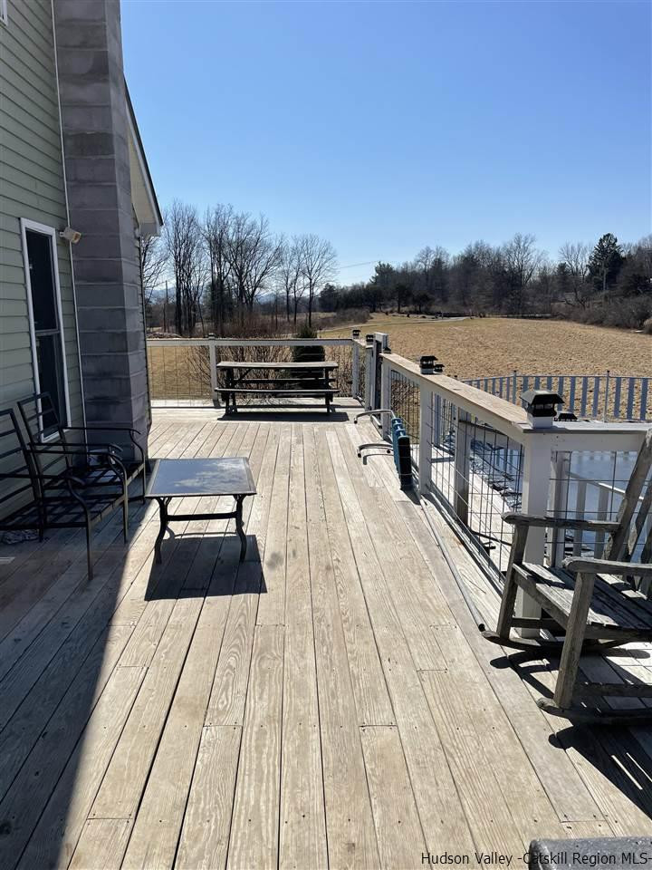 434 Cottekill Road Kingston, NY 12401 - Photo 35 of 35 a view of balcony with wooden floor and barbeque oven