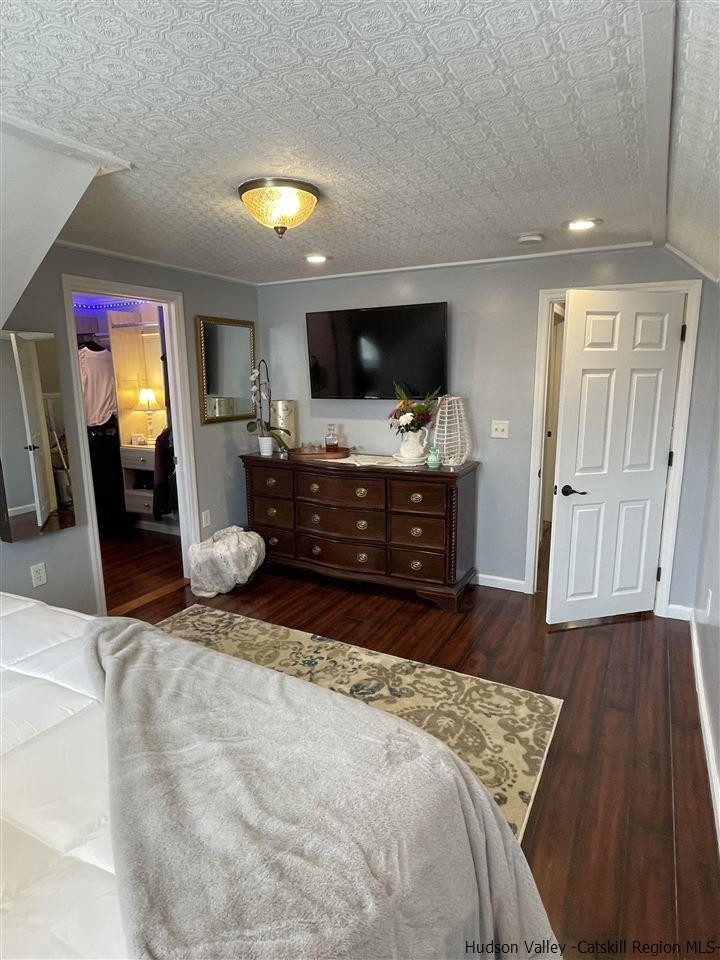 434 Cottekill Road Kingston, NY 12401 - Photo 6 of 35 a living room with furniture and a flat screen tv