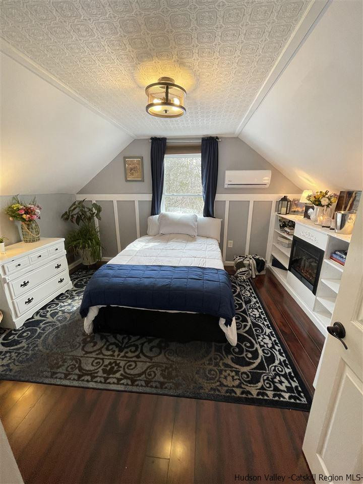 434 Cottekill Road Kingston, NY 12401 - Photo 8 of 35 a living room with furniture and a fireplace