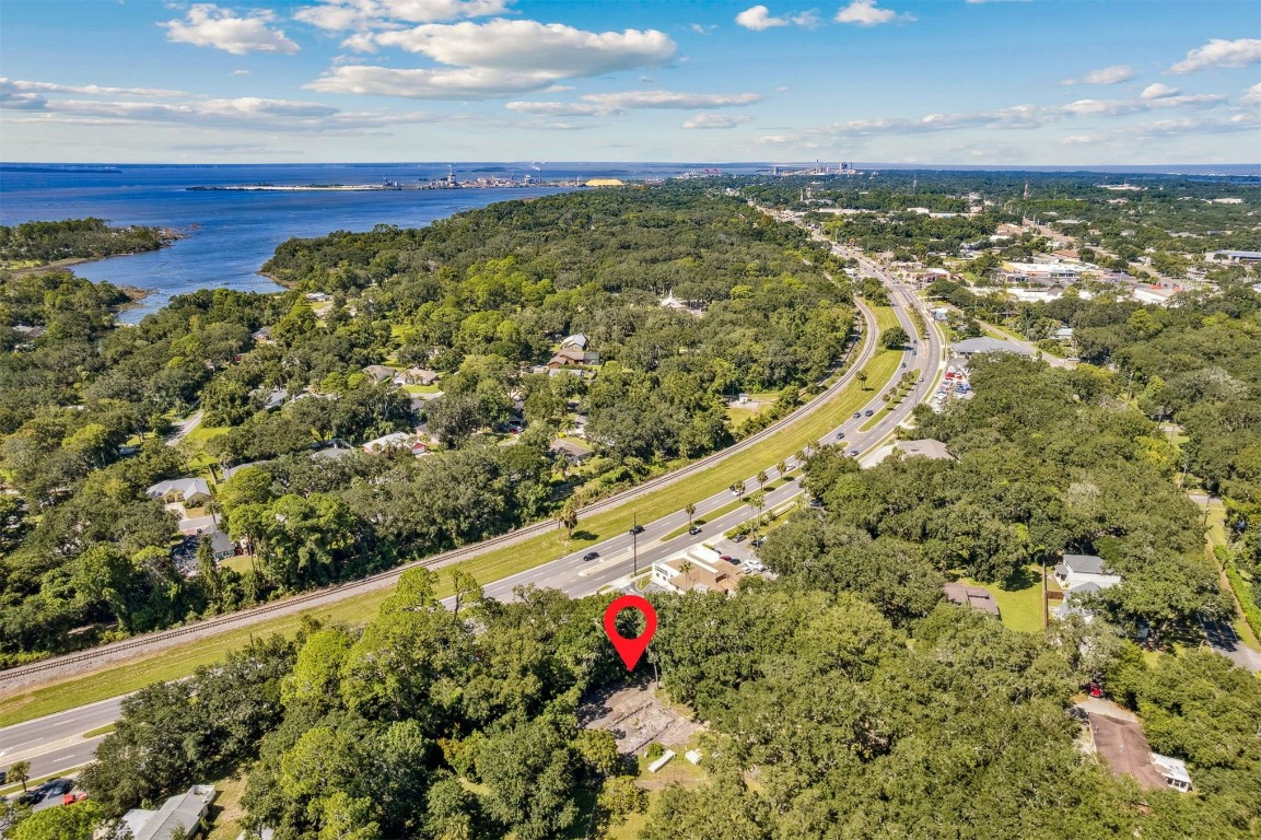 766 Adams Road Fernandina Beach, FL 32034 - Photo 22 of 31 a view of a yard with an ocean view