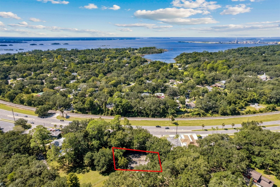 766 Adams Road Fernandina Beach, FL 32034 - Photo 31 of 31 a view of a large yard with lots of green space