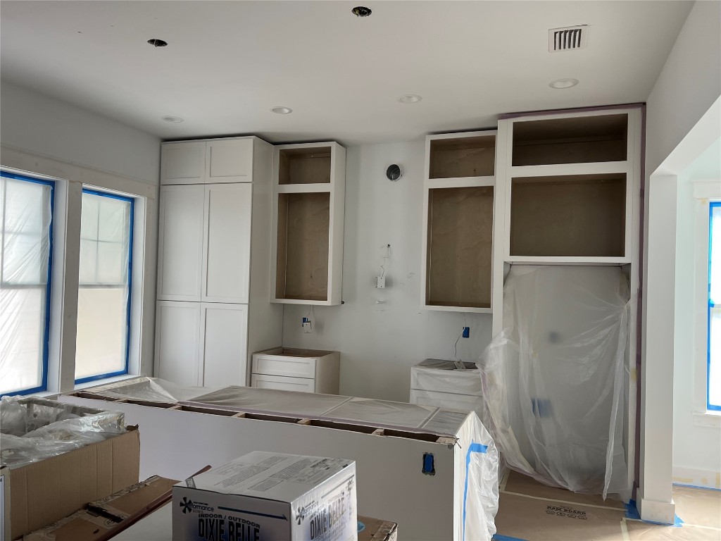 766 Adams Road Fernandina Beach, FL 32034 - Photo 5 of 31 a bathroom with a granite countertop sink and a mirror