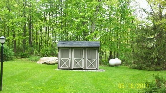 72 Interlaken Road, Unit 3 West Stockbridge, MA 01266 - Photo 4 of 10 a view of a tiny house with backyard