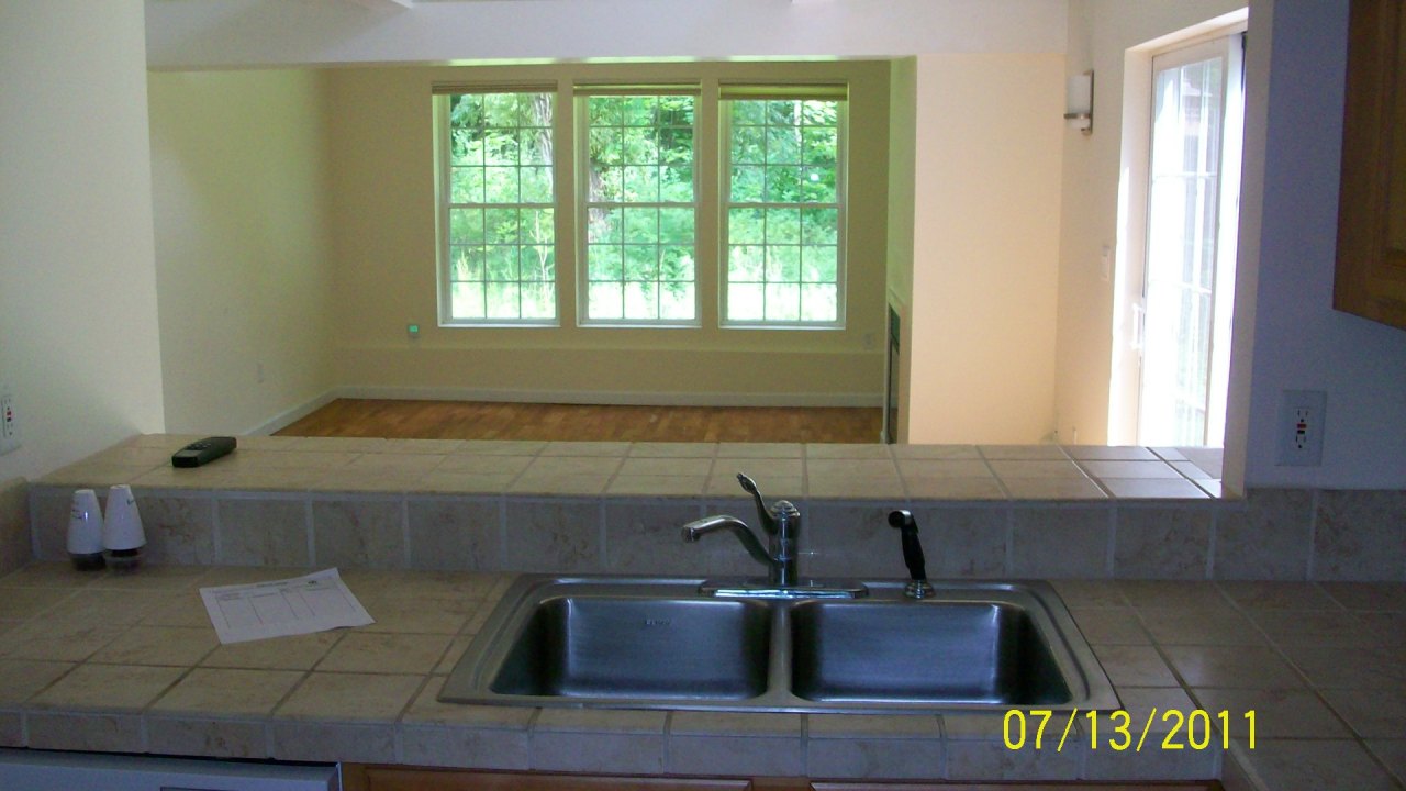 72 Interlaken Road, Unit 3 West Stockbridge, MA 01266 - Photo 8 of 10 a kitchen with a sink and a window
