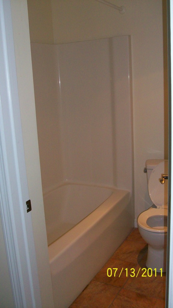 72 Interlaken Road, Unit 3 West Stockbridge, MA 01266 - Photo 9 of 10 a bathroom with a toilet and a bathtub