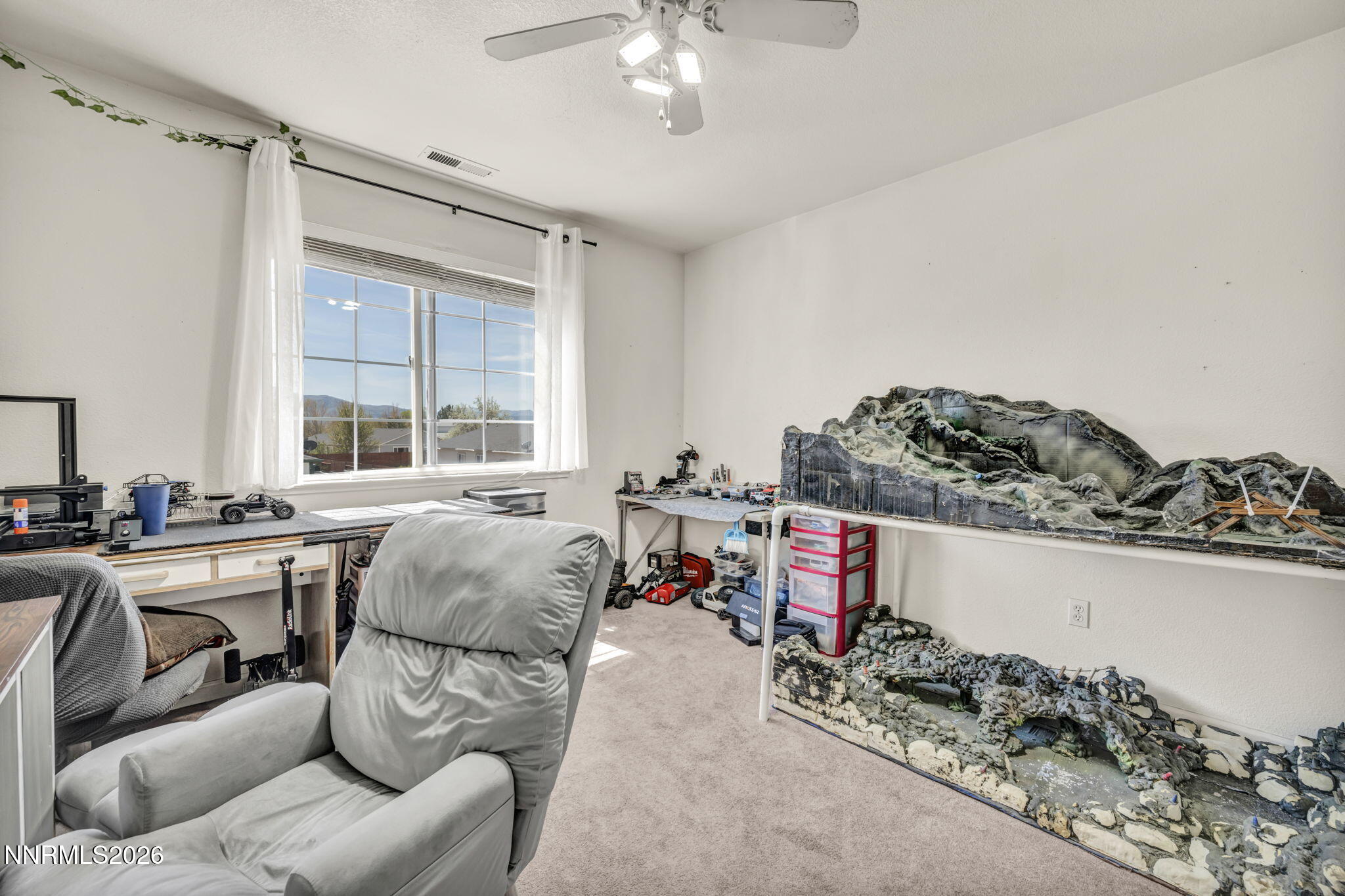 17615 Baileyville Court Reno, NV 89508 - Photo 16 of 19 a living room with furniture and a window