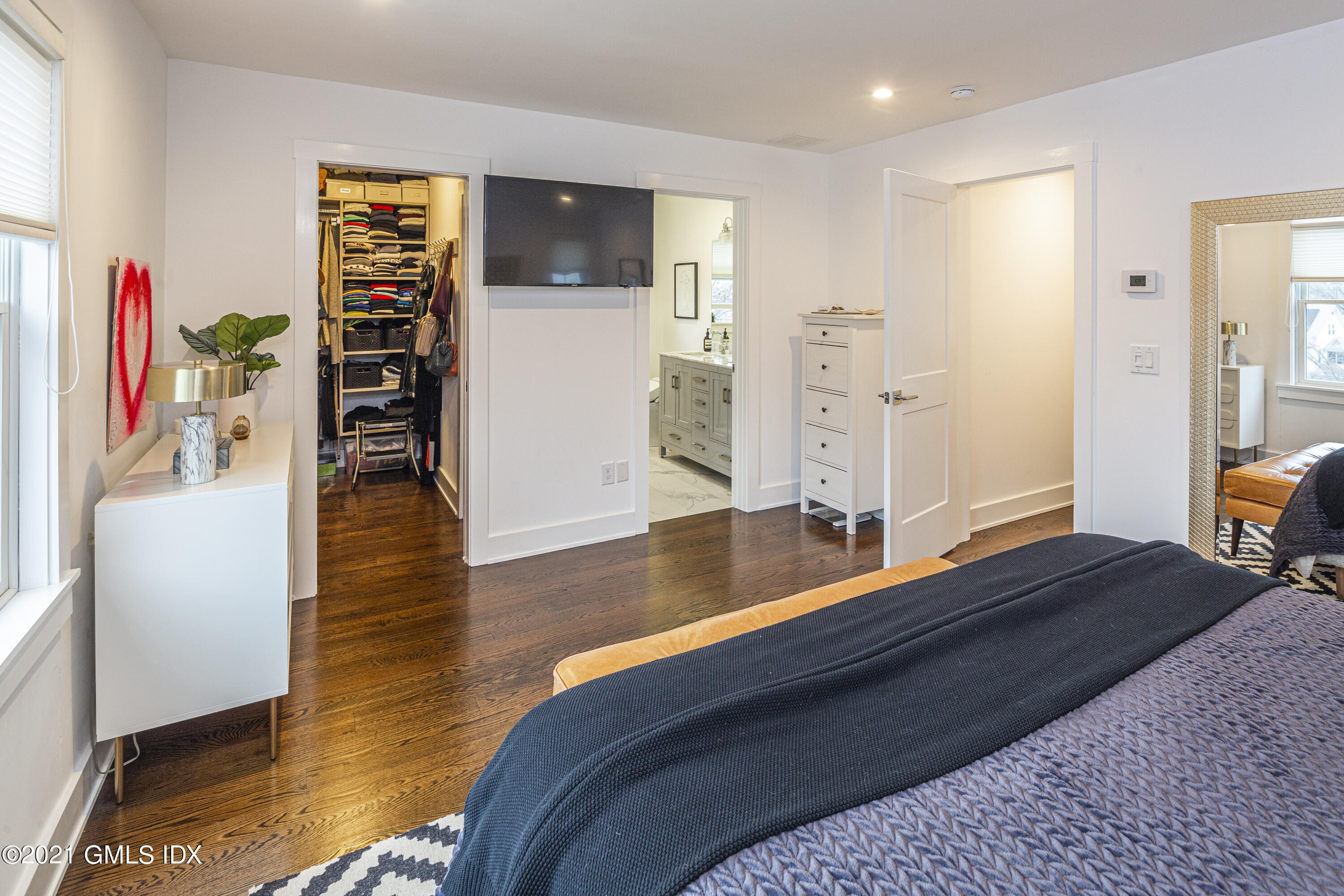 19 Ritch Avenue Greenwich, CT 06830 - Photo 15 of 29 a bedroom with a bed and a television