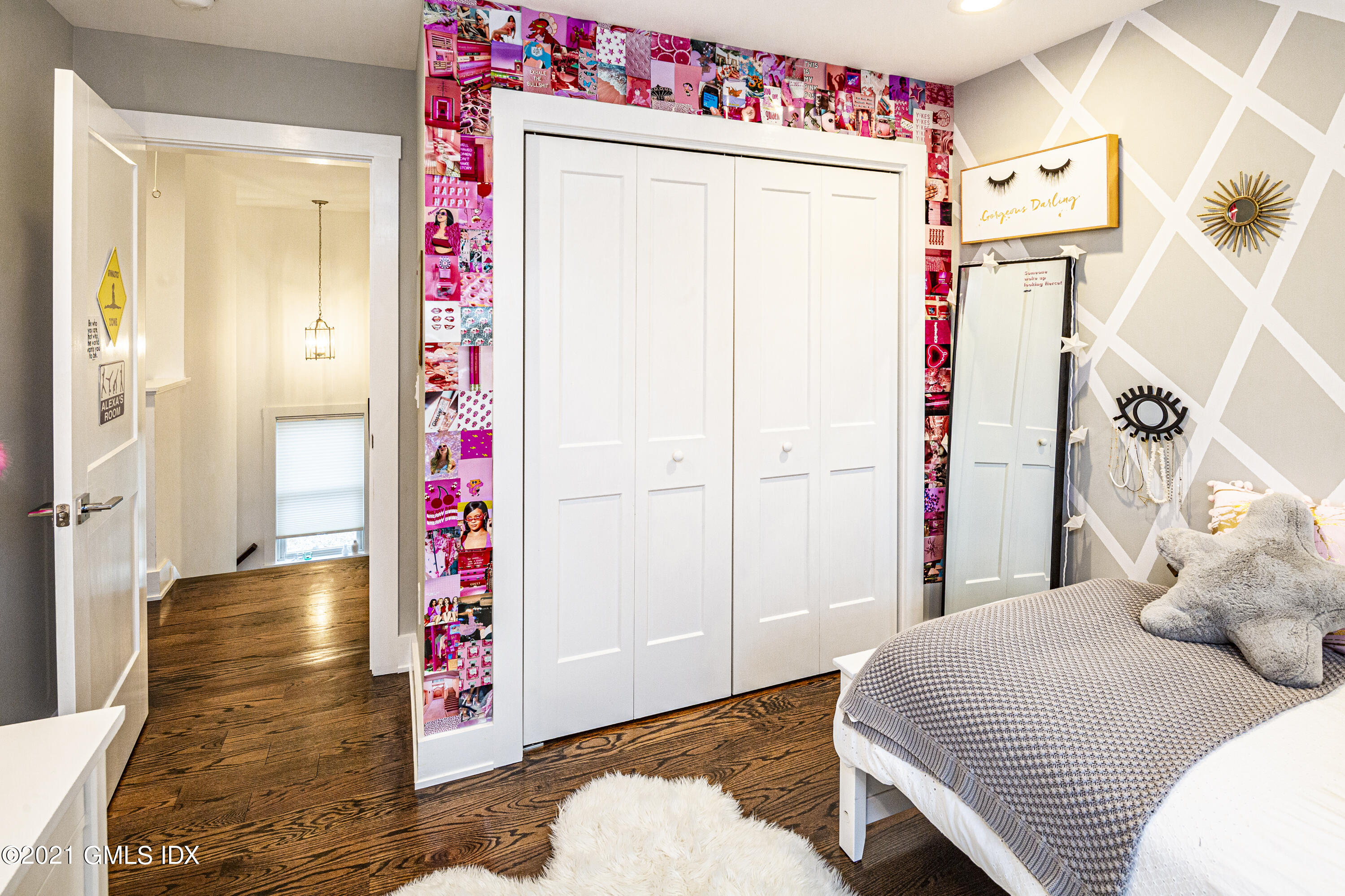 19 Ritch Avenue Greenwich, CT 06830 - Photo 18 of 29 a bedroom with a bed and a white cabinet