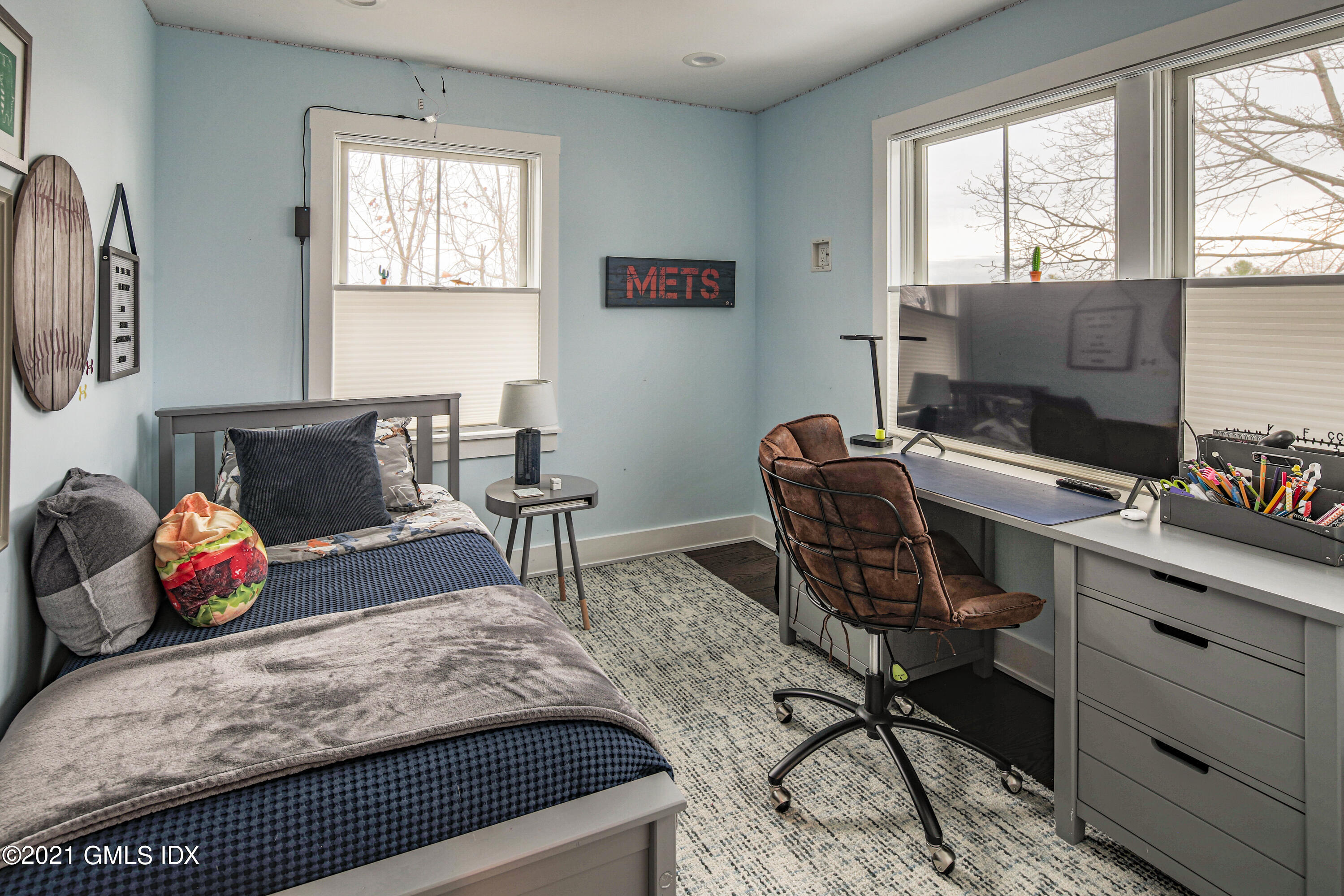 19 Ritch Avenue Greenwich, CT 06830 - Photo 21 of 29 a bedroom with a bed and a window