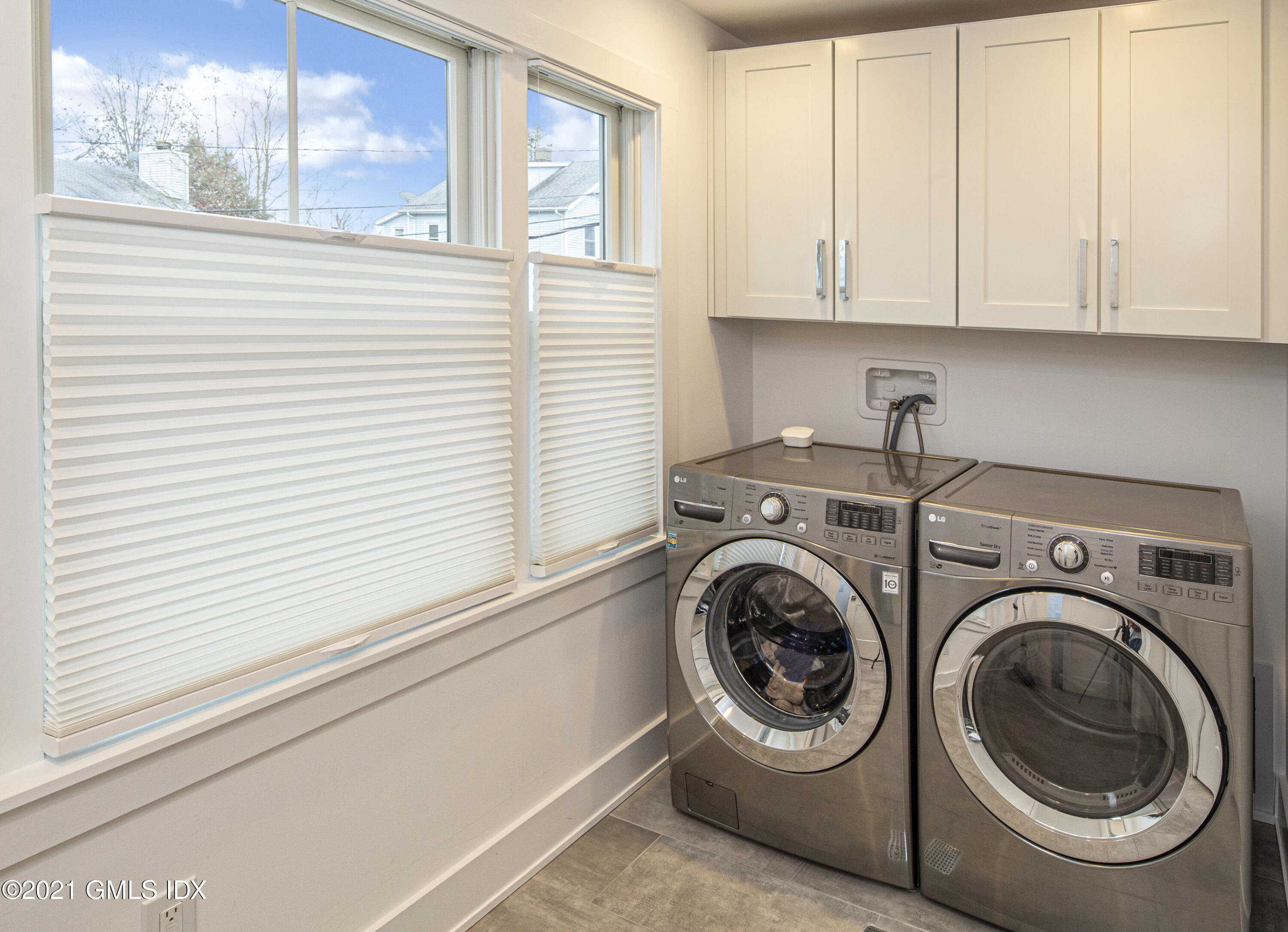 19 Ritch Avenue Greenwich, CT 06830 - Photo 23 of 29 a utility room with dryer and washer