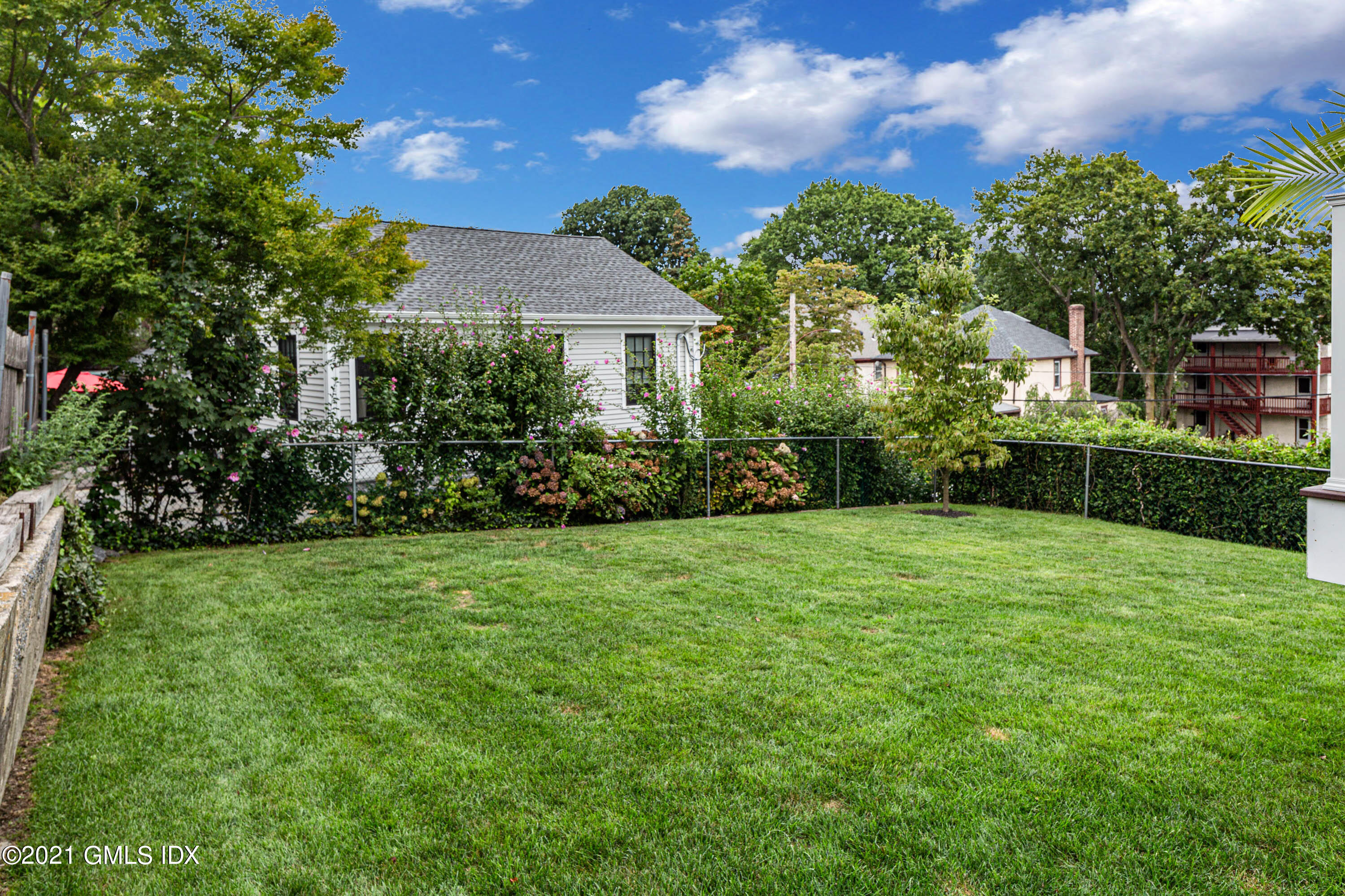 19 Ritch Avenue Greenwich, CT 06830 - Photo 4 of 29 a view of a yard in front of house