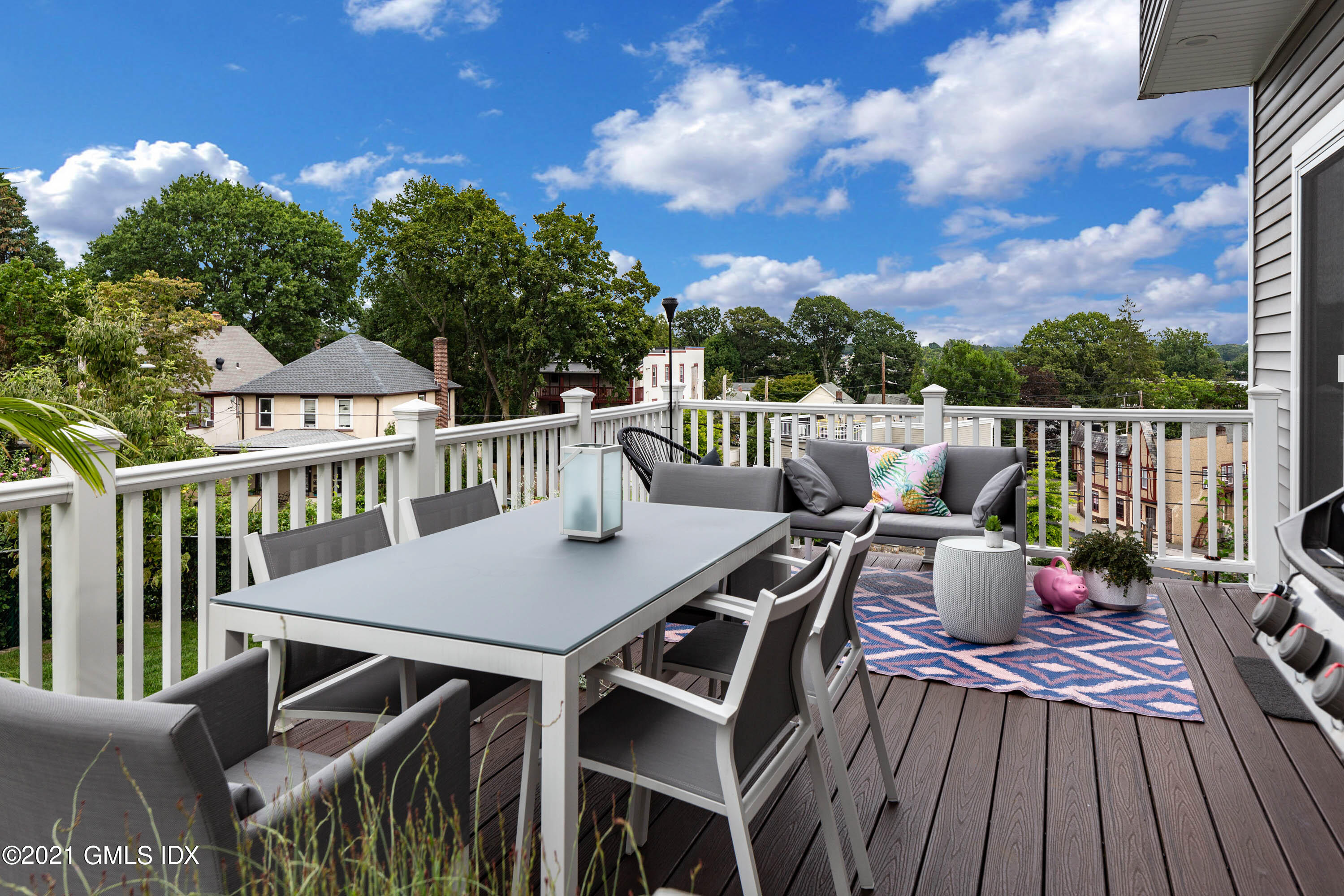 19 Ritch Avenue Greenwich, CT 06830 - Photo 5 of 29 a view of a roof deck with furniture