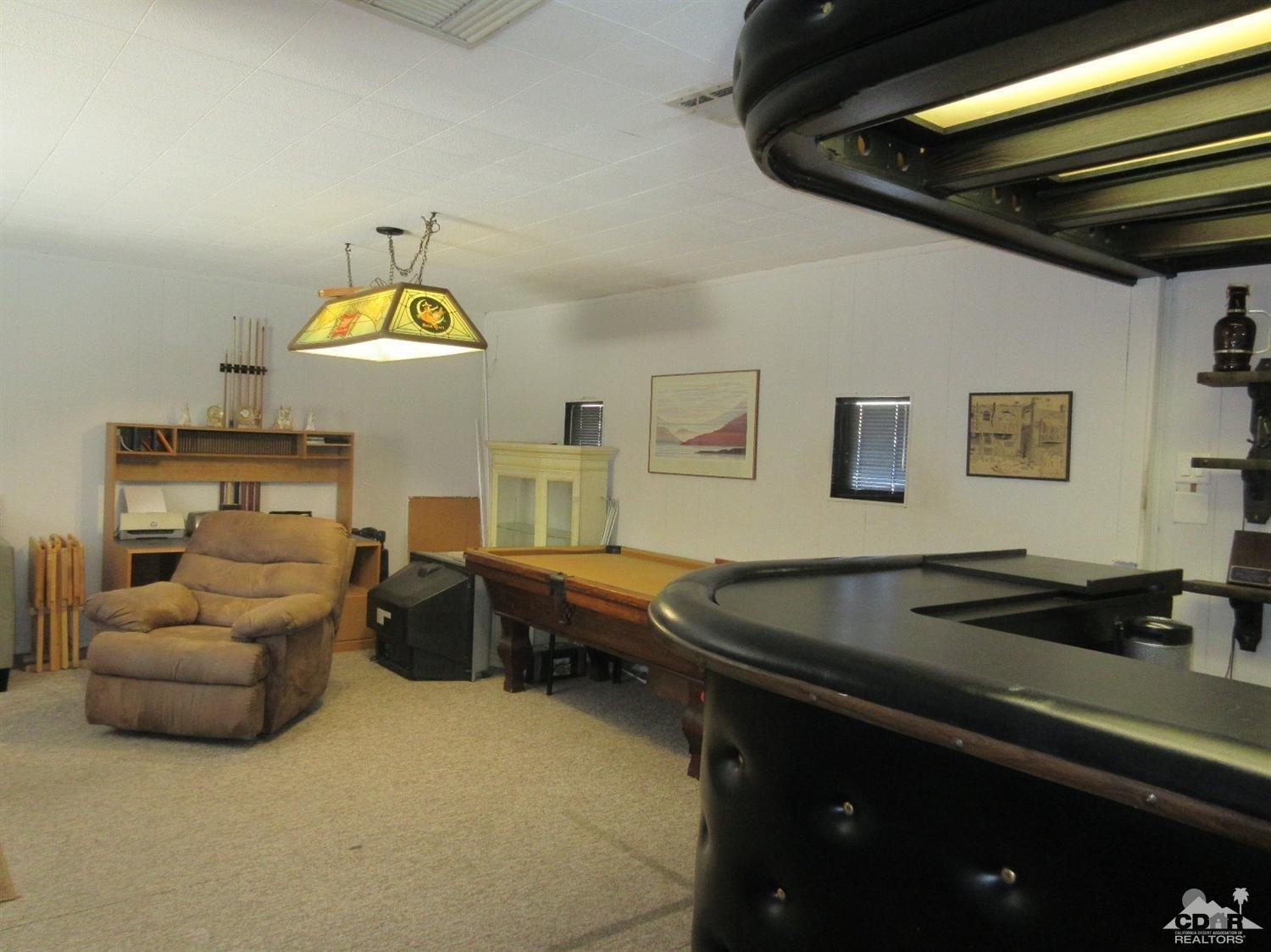 36915 Palmdale Road Rancho Mirage, CA 92270 - Photo 11 of 23 a living room with furniture