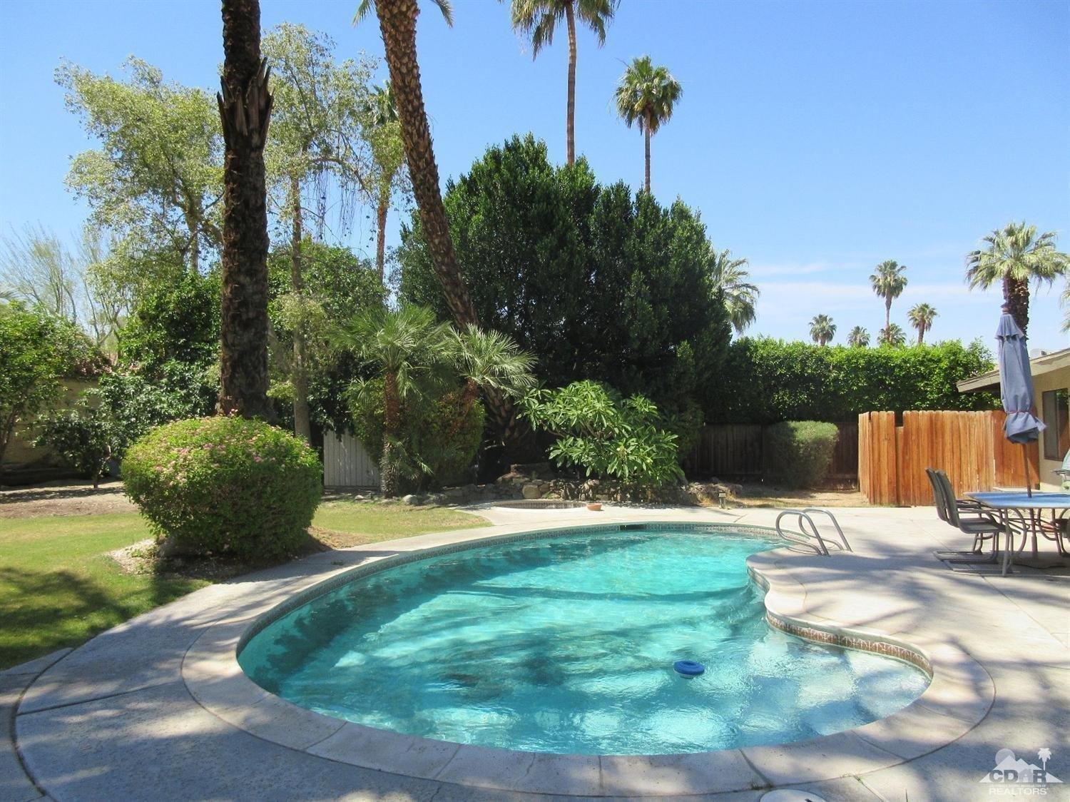 36915 Palmdale Road Rancho Mirage, CA 92270 - Photo 21 of 23 a view of a backyard with sitting area