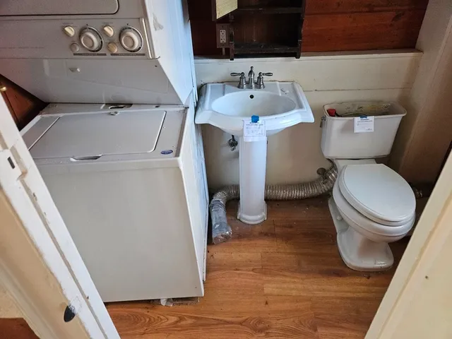 a bathroom with a toilet and a sink