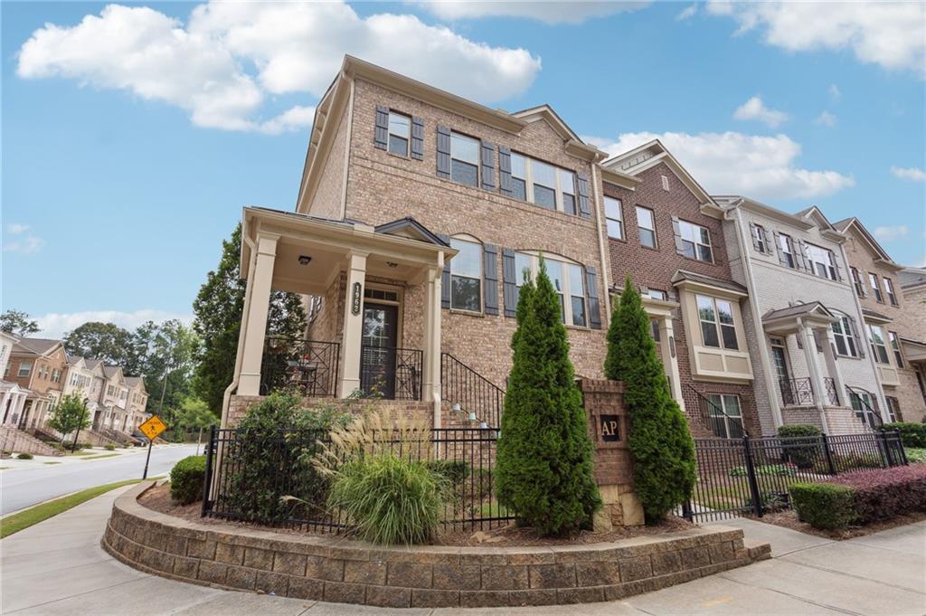 a front view of a multi story residential apartment building
