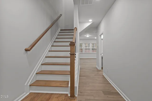 a terrace with outdoor seating and city view