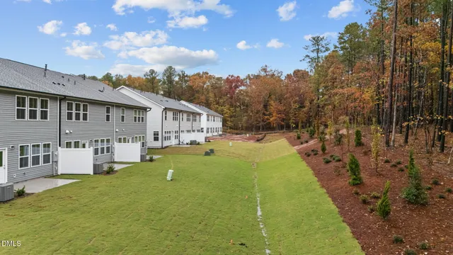 a aerial view of a house with a swimming pool