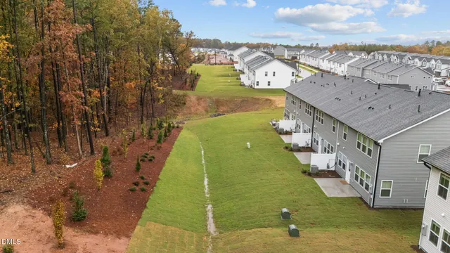 a house view with a backyard space