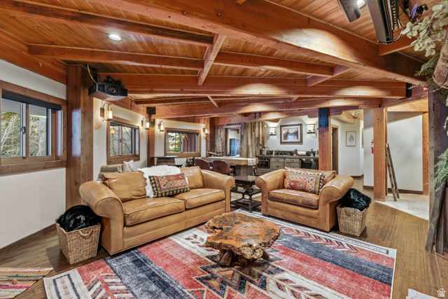 2687 Stewart Road Sundance, UT 84604 - Photo 19 of 48 Living room with a wooden ceiling with exposed beams and wood finished floors