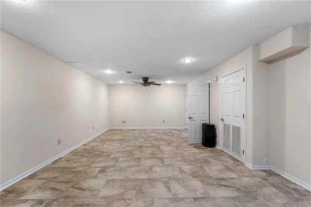 a view of a balcony with wooden floor