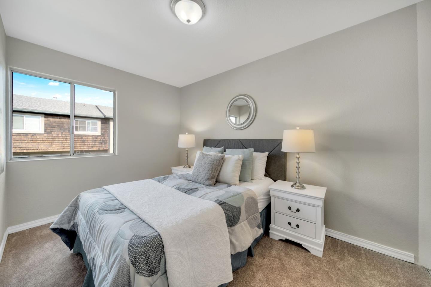 1433 Big Basin Drive Milpitas, CA 95035 - Photo 19 of 23 a bedroom with a bed and a window