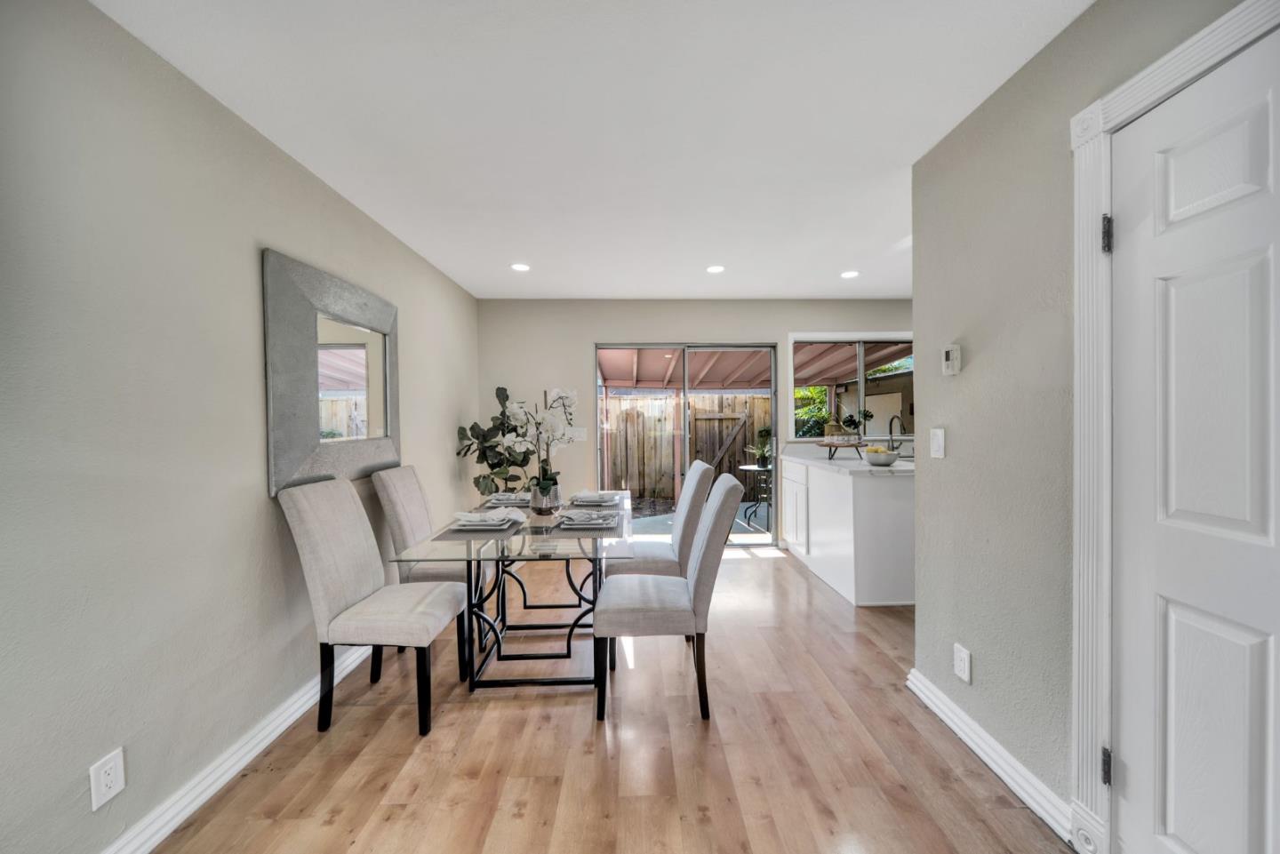 1433 Big Basin Drive Milpitas, CA 95035 - Photo 8 of 23 a dining room with furniture and wooden floor