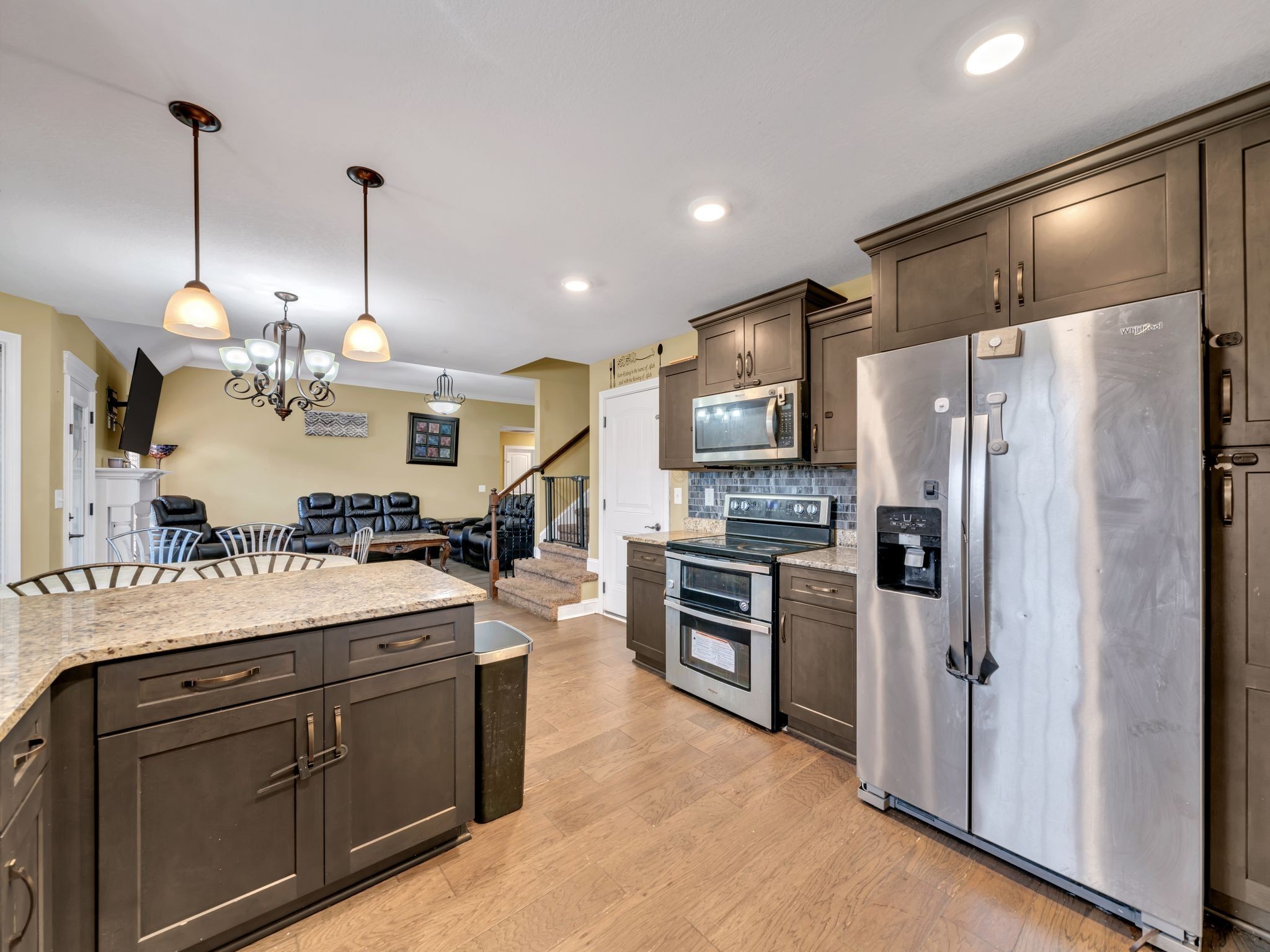 1084 Harrison Way Clarksville, TN 37042 - Photo 11 of 31 a kitchen with kitchen island a counter top space a sink stainless steel appliances and cabinets