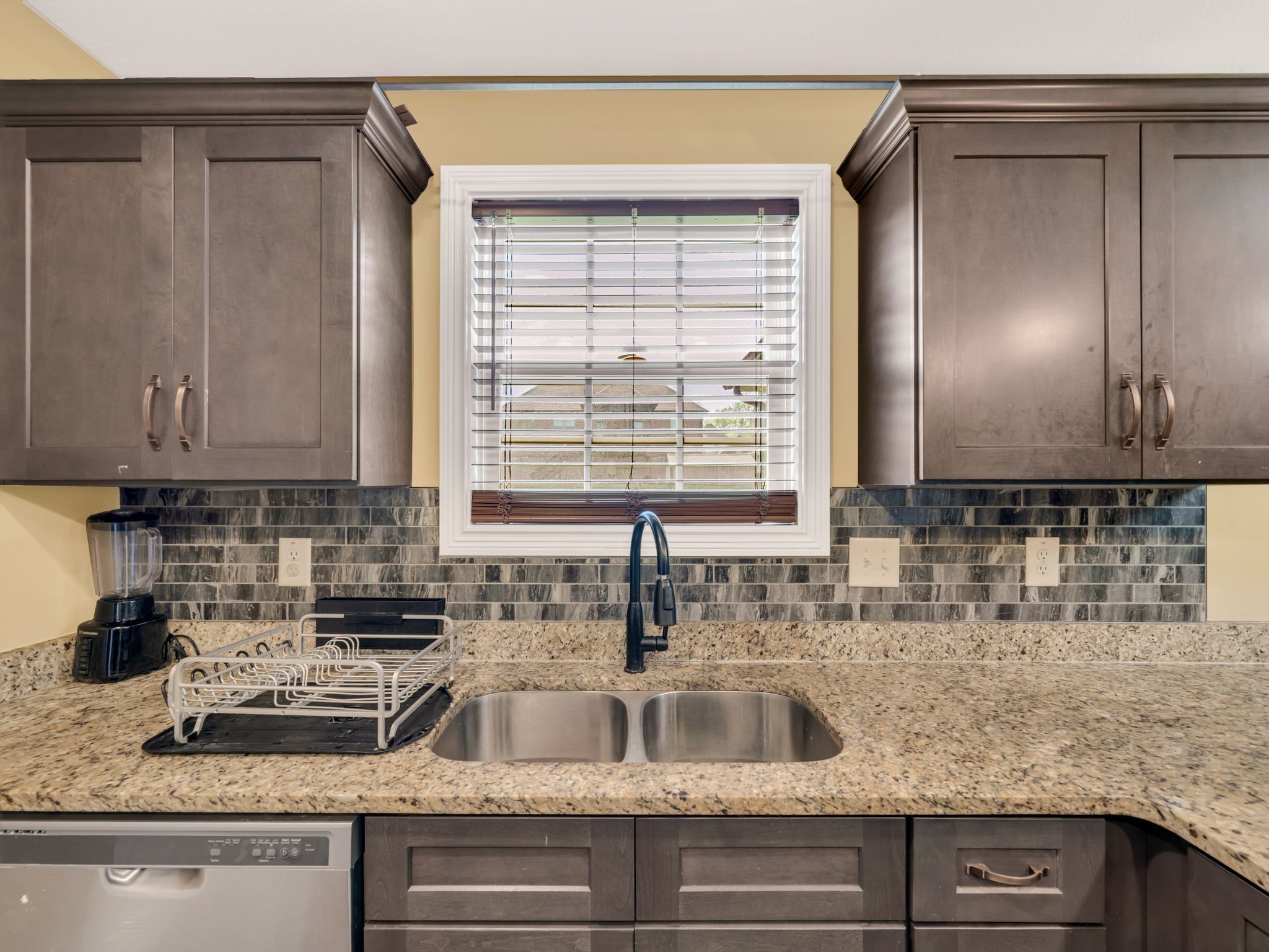 1084 Harrison Way Clarksville, TN 37042 - Photo 12 of 31 a kitchen with granite countertop a sink and a window