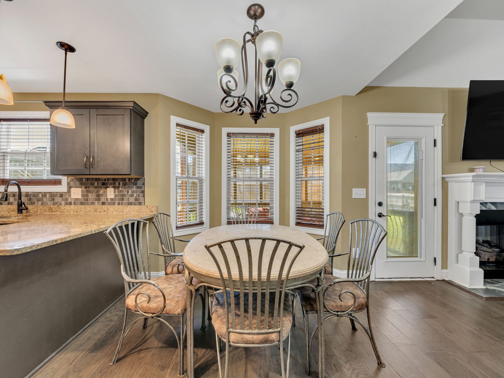 1084 Harrison Way Clarksville, TN 37042 - Photo 13 of 31 a view of a dining room with furniture window and wooden floor