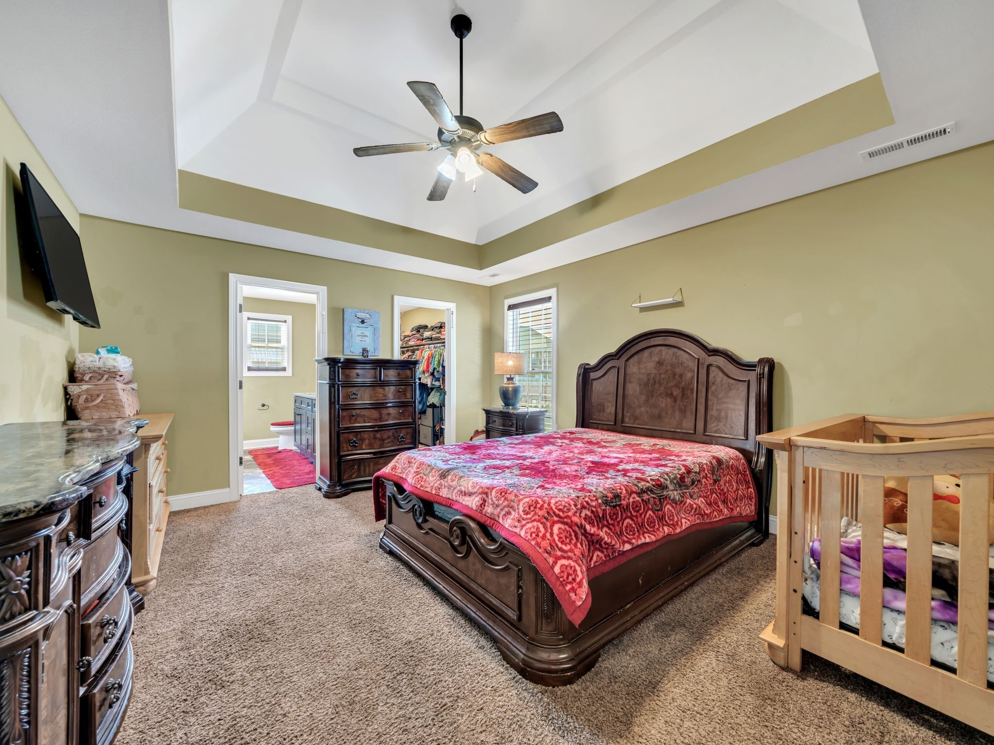 1084 Harrison Way Clarksville, TN 37042 - Photo 14 of 31 a bedroom with a bed and a flat tv screen on dresser