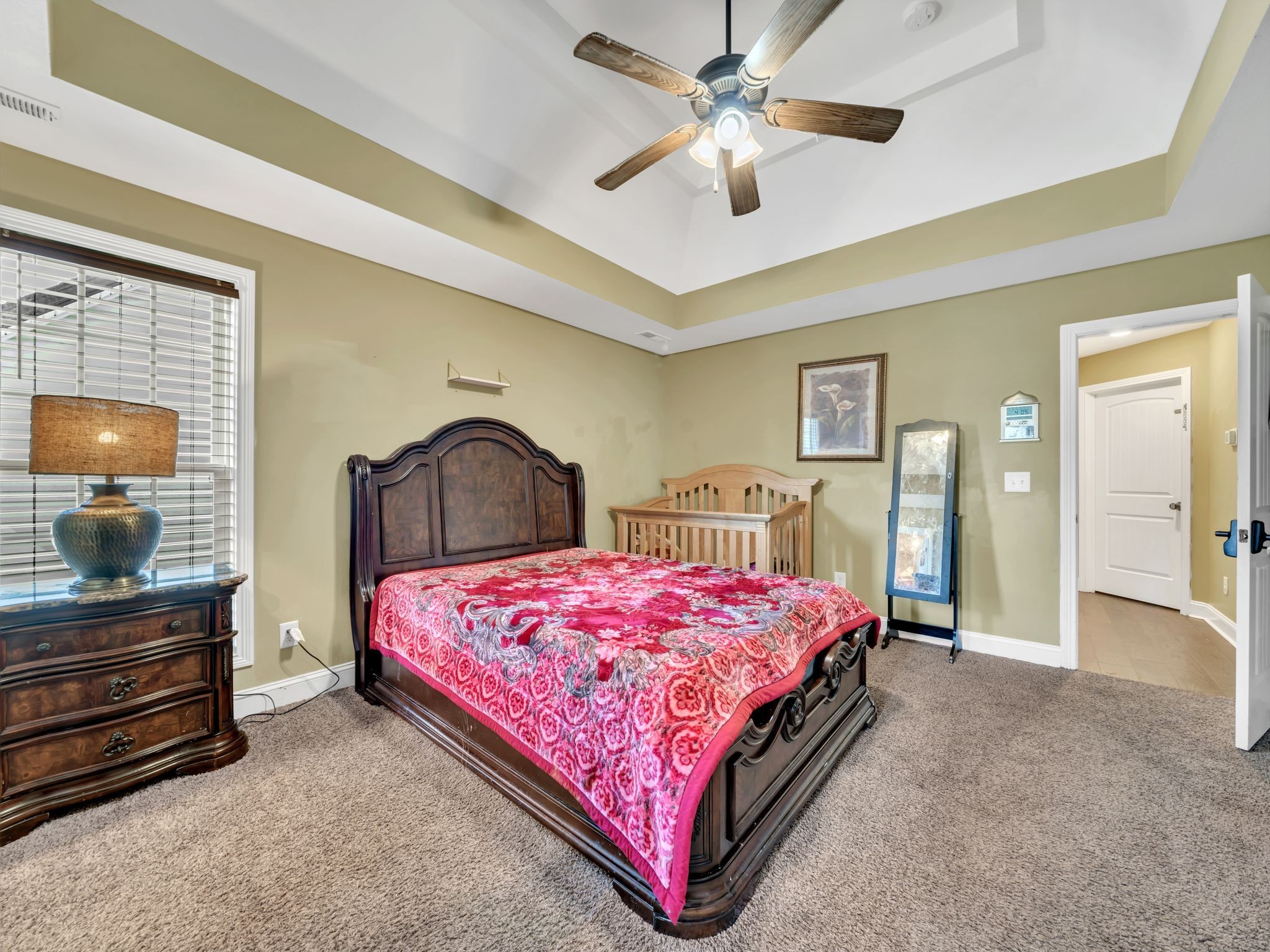 1084 Harrison Way Clarksville, TN 37042 - Photo 15 of 31 a bedroom with a bed and dresser with mirror