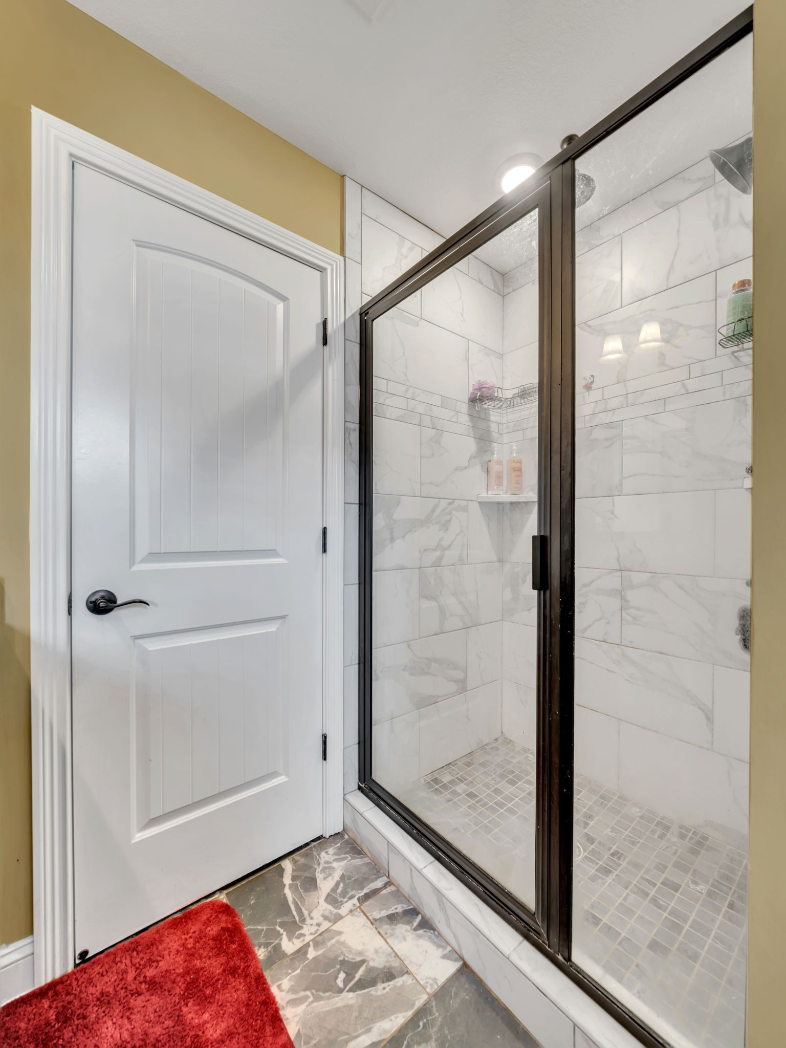 1084 Harrison Way Clarksville, TN 37042 - Photo 19 of 31 a bathroom with a glass shower door