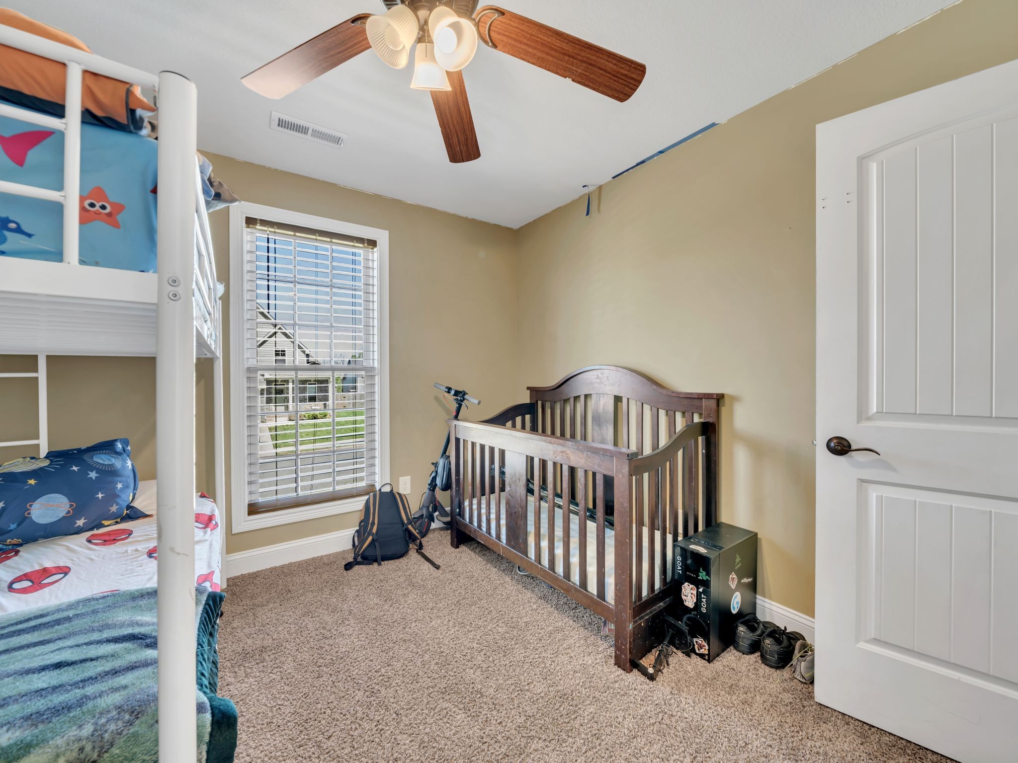 1084 Harrison Way Clarksville, TN 37042 - Photo 20 of 31 a view of a bedroom with a bed and a window