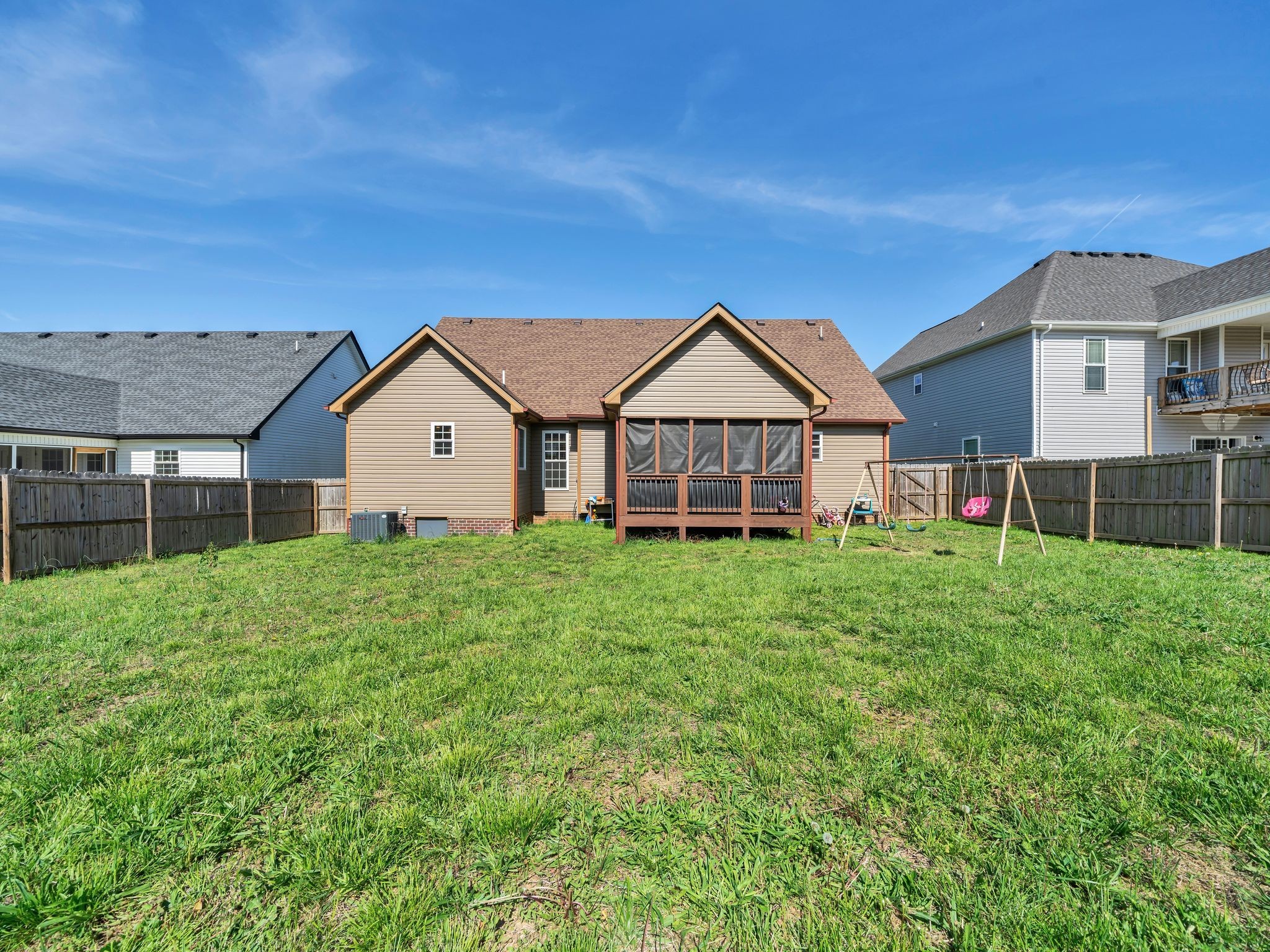 1084 Harrison Way Clarksville, TN 37042 - Photo 27 of 31 a view of a big house with a big yard and large trees