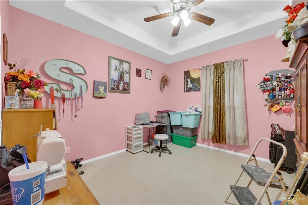 715 North Gonzalez Road Weslaco, TX 78596 - Photo 12 of 31 a view of a room with gym equipment