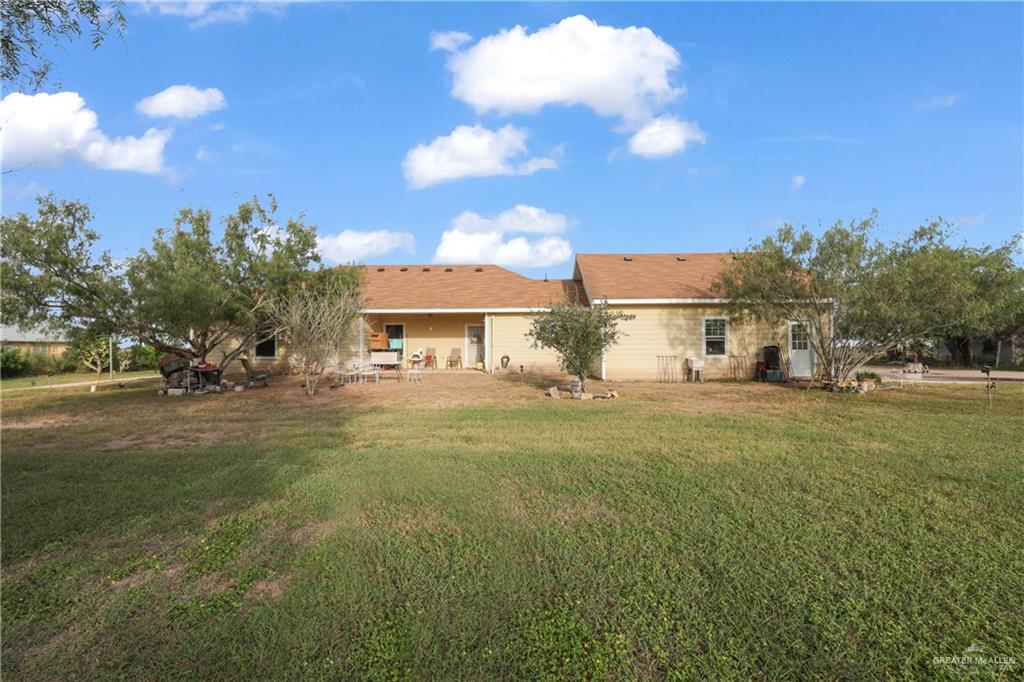 715 North Gonzalez Road Weslaco, TX 78596 - Photo 18 of 31 a view of a street with houses