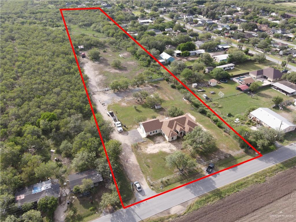 715 North Gonzalez Road Weslaco, TX 78596 - Photo 25 of 31 a view of a book in a yard