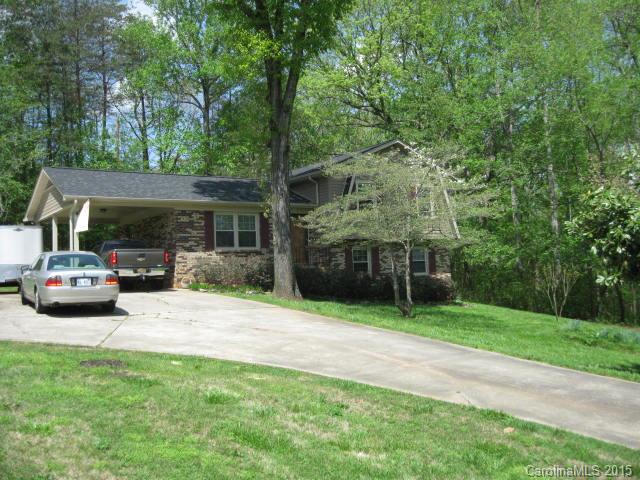 635 Miles Road Dallas, NC 28034 - Photo 1 of 17 a view of a back yard of the house