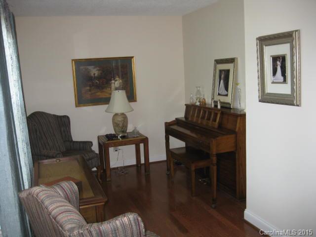 635 Miles Road Dallas, NC 28034 - Photo 10 of 17 a living room with furniture and a wooden floor