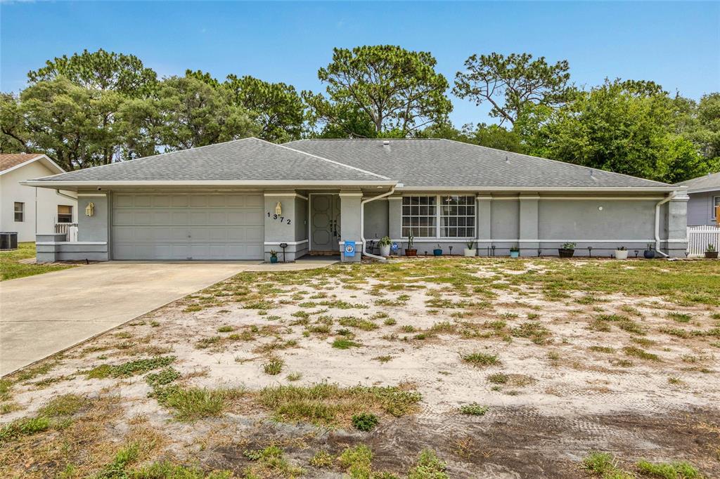 1372 Haulover Avenue Spring Hill, FL 34608 - Photo 1 of 40