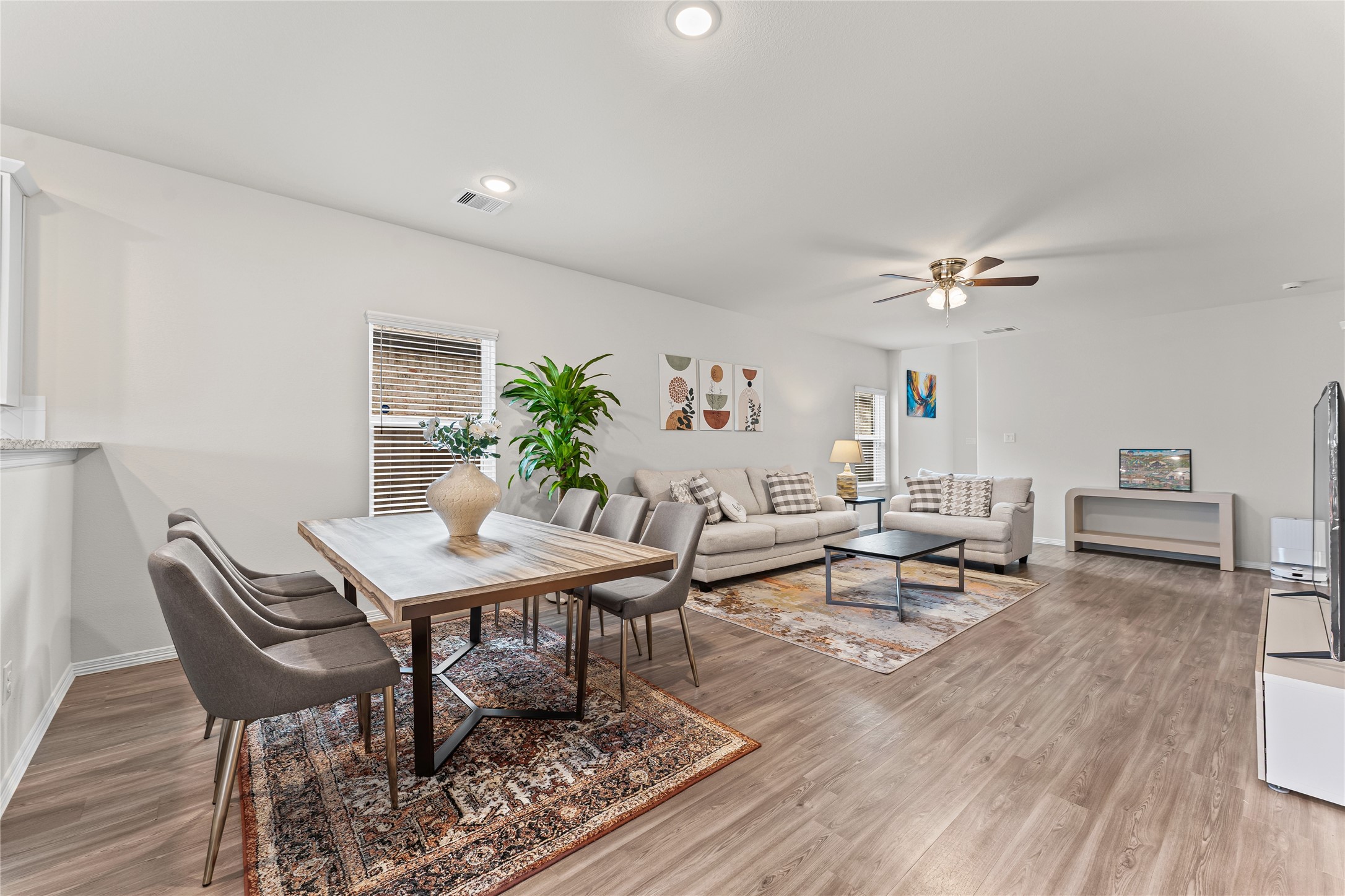 23326 Spring Genesis Lane Katy, TX 77493 - Photo 8 of 32 This seamless layout flows directly into the dining area, creating the ultimate environment for hosting unforgettable dinner parties and family celebrations.