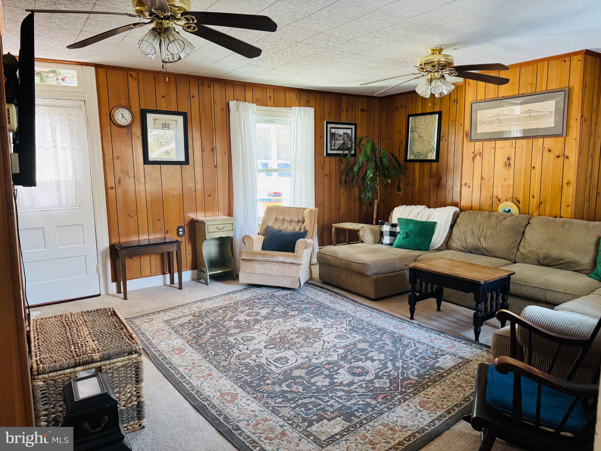 12704 Newland Road Warsaw, VA 22572 - Photo 4 of 8 Cozy retreat with warm wood accents.