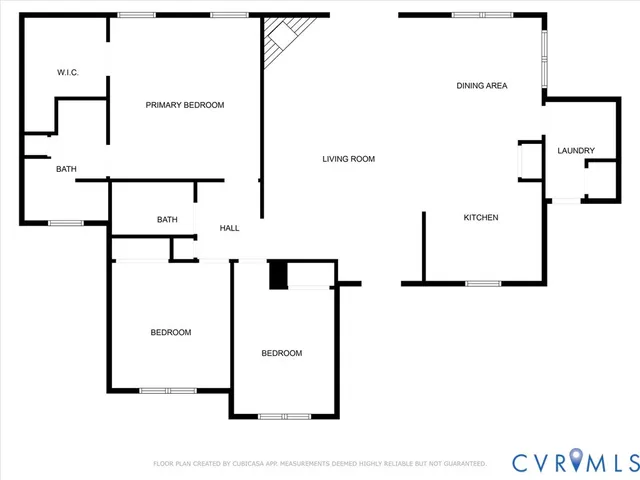 a front view of a house with yard and seating area