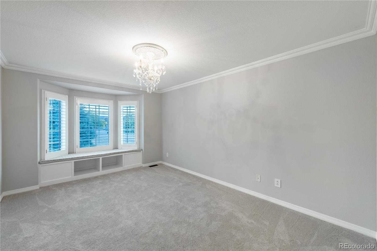 10734 Cougar Ridge Lone Tree, CO 80124 - Photo 15 of 35 an empty room with a window
