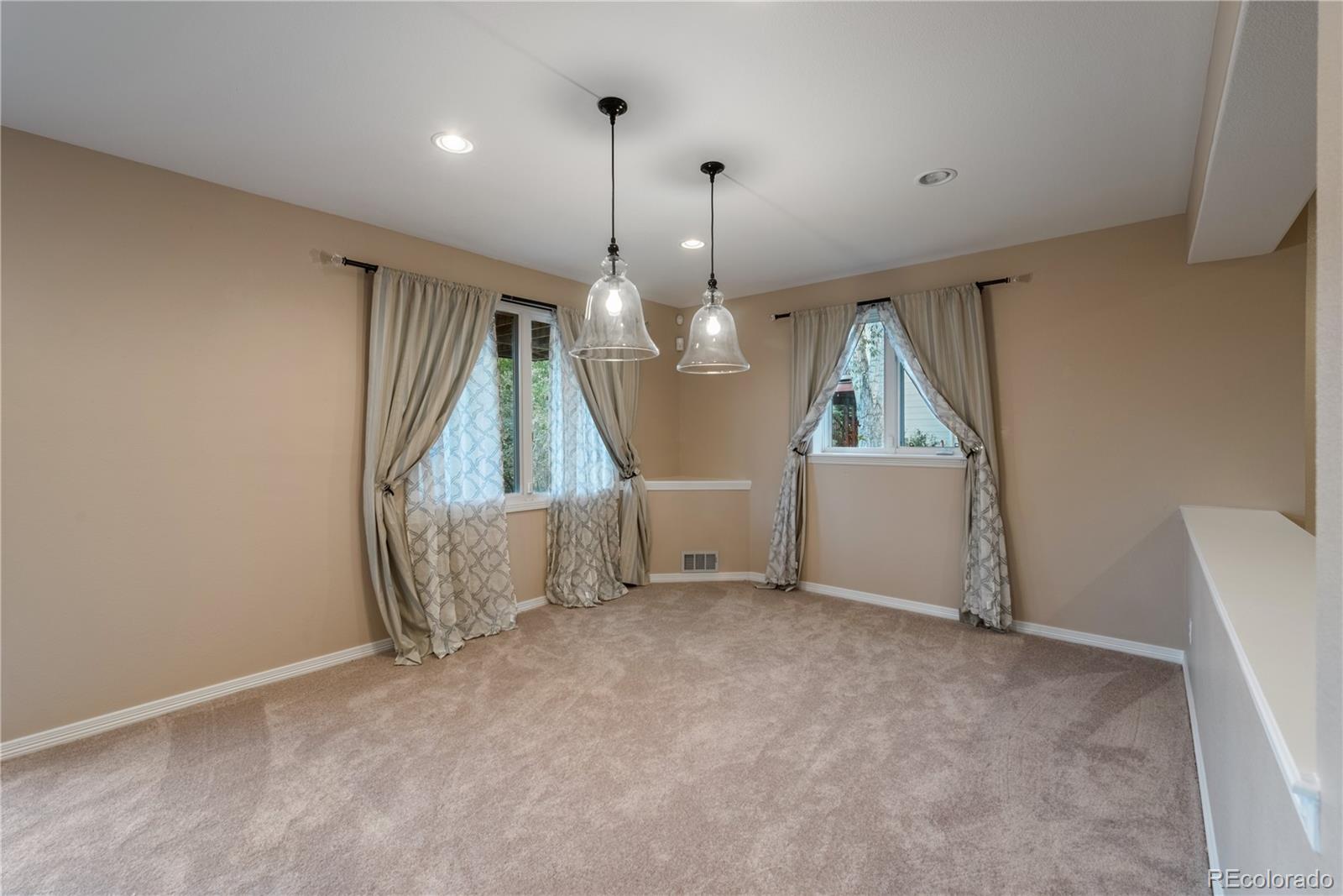 10734 Cougar Ridge Lone Tree, CO 80124 - Photo 31 of 35 an entryway in an empty room